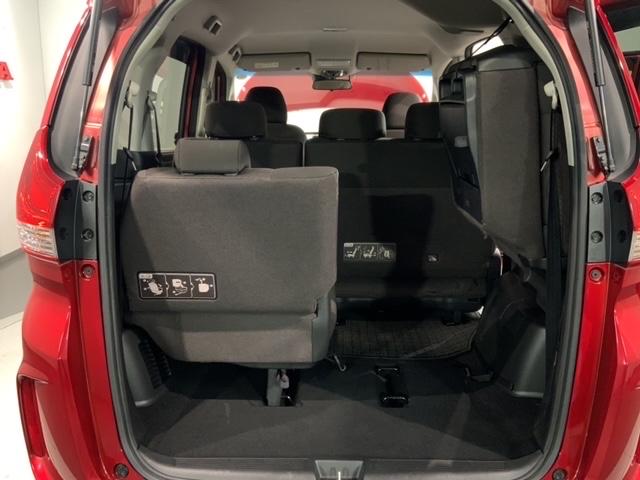 フリード Ｇ・ホンダセンシング　最長５年保証　ワンオ－ナ－　ナビＶＸＭ－２１４ＶＦｉ　ＴＶ　Ｒカメラ　ＣＤ録音　ＢＴオ－ディオ　ＤＶＤ　ＥＴＣ　両側電動ドア　ＶＳＡ　スマ－トキ－　スペアキー　盗難防止装置　整備記録簿　ドアバイザ－（37枚目）