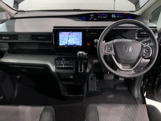 ステップワゴンスパーダ スパーダホンダセンシング　１年保証　ワンオーナー　ナビ　ＴＶ　Ｒカメラ　ＣＤ録音　ＢＴオ－ディオ　ＤＶＤ　ＥＴＣ　ＬＥＤライト　ＶＳＡ　両側電動ドア　クルコン　アルミ　フォグ　スマートキー　盗難防止装置　整備記録簿　ＡＡＣ（9枚目）