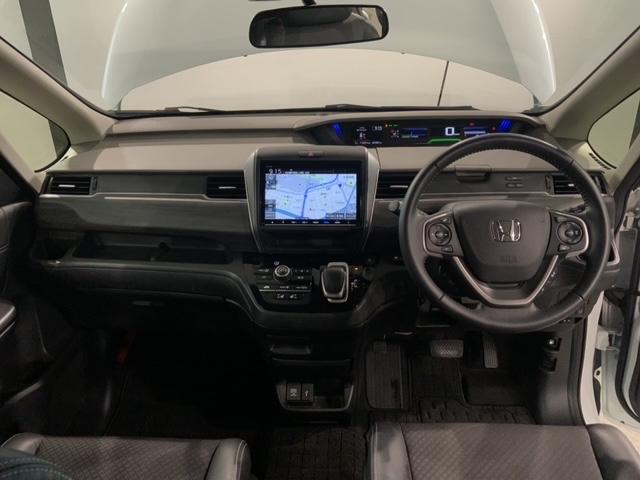 フリードハイブリッド ハイブリッド・Ｇホンダセンシング　最長５年保証　ワンオーナー　ナビＶＸＭ－２１７ＶＦＮｉ　ＴＶ　Ｒカメラ　ＣＤ録音　ＢＴオ－ディオＤＶＤ　ＥＴＣ　ＬＥＤライト　両側電動ドア　ＶＳＡ　シ－トヒ－タ－　クルコン　アルミ　スマ－トキ－ＡＡＣ（9枚目）