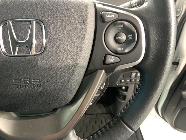 フリードハイブリッド ハイブリッド・Ｇホンダセンシング　最長５年保証　ワンオーナー　ナビＶＸＭ－２１７ＶＦＮｉ　ＴＶ　Ｒカメラ　ＣＤ録音　ＢＴオ－ディオＤＶＤ　ＥＴＣ　ＬＥＤライト　両側電動ドア　ＶＳＡ　シ－トヒ－タ－　クルコン　アルミ　スマ－トキ－ＡＡＣ（11枚目）
