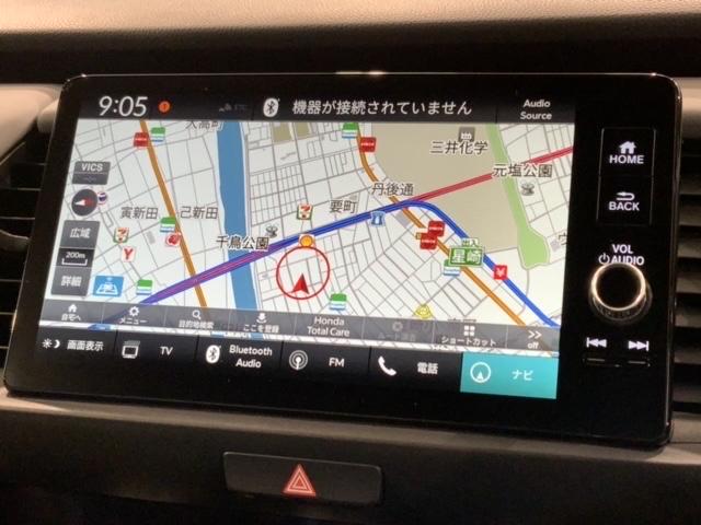 フィット ｅ：ＨＥＶＲＳ　ＨｏｎｄａＳＥＮＳＩＮＧ新車保証試乗禁煙車　ワンオーナー車　ＶＳＡ　Ｒカメラ　サイドエアバック　スマートキー　ＬＥＤヘッドランプ　クルコン　エアコン　ＥＴＣ　盗難防止装置　ＡＢＳ　エアバック　フルセグ（5枚目）