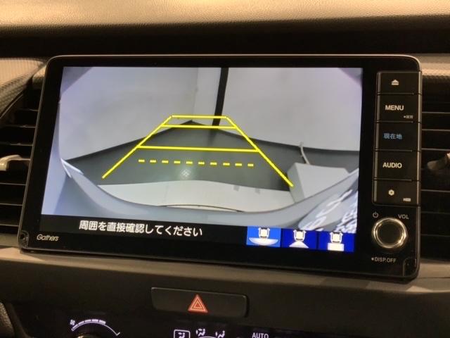 フィット ｅ：ＨＥＶベーシック　ＨｏｎｄａＳＥＮＳＩＮＧ新車保証試乗禁煙車　追突軽減ブレーキ　ワンオーナー車　フルセグＴＶ　カーテンエアバック　Ｒカメ　ＬＥＤ　パワーウインドウ　スマキー　横滑り防止　オートエアコン　ＥＴＣ車載器（6枚目）