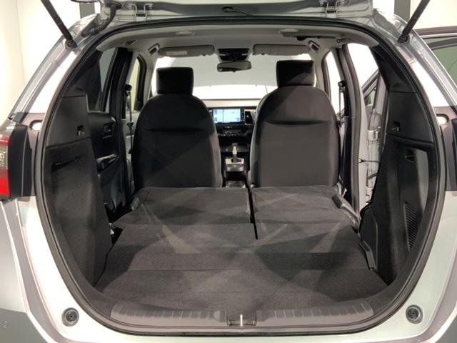 フィット ｅ：ＨＥＶベーシック　ＨｏｎｄａＳＥＮＳＩＮＧ新車保証試乗禁煙車　追突軽減ブレーキ　ワンオーナー車　フルセグＴＶ　カーテンエアバック　Ｒカメ　ＬＥＤ　パワーウインドウ　スマキー　横滑り防止　オートエアコン　ＥＴＣ車載器（18枚目）