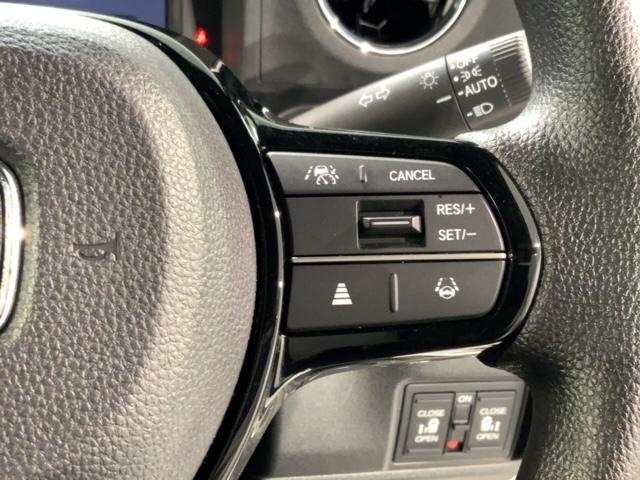 Ｎ－ＢＯＸカスタム ベースグレード　ＨｏｎｄａＳＥＮＳＩＮＧ新車保証試乗禁煙車　追突軽減ブレーキ　Ｂカメ　スマキー　ＬＥＤライト　オートエアコン　前席シートヒーター　クルーズコントロール　ＥＴＣ　ＥＳＣ　サイドカーテンエアバック　地デジ（10枚目）