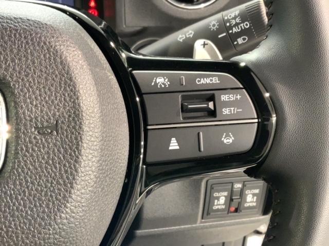 Ｎ－ＢＯＸカスタム ターボ　ＨｏｎｄａＳＥＮＳＩＮＧ新車保証試乗禁煙車　誤発進抑制　セキュリティー　ＬＥＤランプ　整備記録簿　サイドＳＲＳ　アクティブクルーズコントロール　シートヒータ　エアバッグ　Ｒカメラ　ＥＴＣ車載器　ＡＢＳ（10枚目）