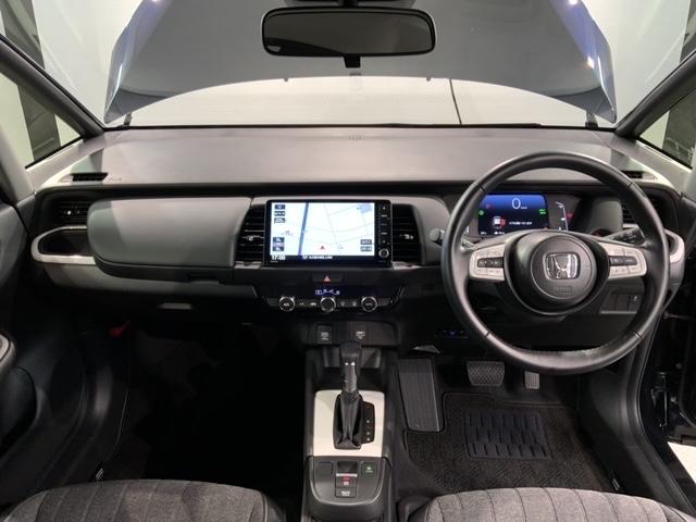 フィット e:HEVホーム HSENSING 新車保証 試乗車 ワンオ-ナ- ナビVXU-245FTi TV Rカメラ CD録音 BTオ-ディオ DVD ETC LEDライト VSA クルコン スマ-トキ- スペアキ- AAC(9枚目)