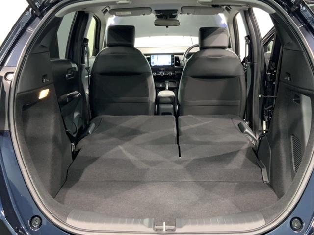 フィット e:HEVホーム HSENSING 新車保証 試乗車 ワンオ-ナ- ナビVXU-245FTi TV Rカメラ CD録音 BTオ-ディオ DVD ETC LEDライト VSA クルコン スマ-トキ- スペアキ- AAC(19枚目)