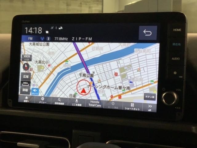 フリード クロスター　ＳＥＮＳＩＮＧ　最長５年　禁煙試乗車　９ｉｎナビ　ＴＶ　Ｒカメラ　Ｂｌｕｅｔｏｏｔｈ　ＣａｒＰｌａｙ　ＡｎｄｒｏｉｄＡｕｔｏ　ＥＴＣ　ＬＥＤライト　両側電動ドア　シートヒーター　フォグ　ＢＳＩ（6枚目）