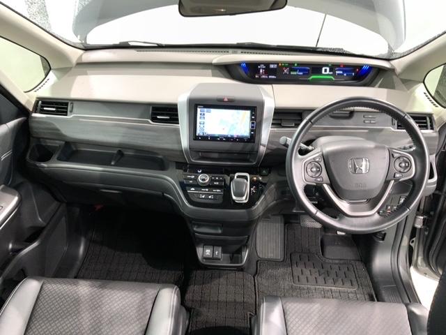 フリードハイブリッド ハイブリッド・Ｇホンダセンシング　最長５年保証　ナビＶＸＭ－２１４ＶＦｉ　ＴＶ　Ｒカメラ　ＣＤ録音　ＢＴオ－ディオ　ＤＶＤ　ＥＴＣ　ＬＥＤライト　両側電動ドア　ＶＳＡ　シ－トヒ－タ－　クルコン　アルミ　スマ－トキ－　盗難防止装置（9枚目）