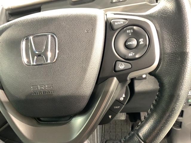 フリードハイブリッド ハイブリッド・Ｇホンダセンシング　最長５年保証　ナビＶＸＭ－２１４ＶＦｉ　ＴＶ　Ｒカメラ　ＣＤ録音　ＢＴオ－ディオ　ＤＶＤ　ＥＴＣ　ＬＥＤライト　両側電動ドア　ＶＳＡ　シ－トヒ－タ－　クルコン　アルミ　スマ－トキ－　盗難防止装置（11枚目）