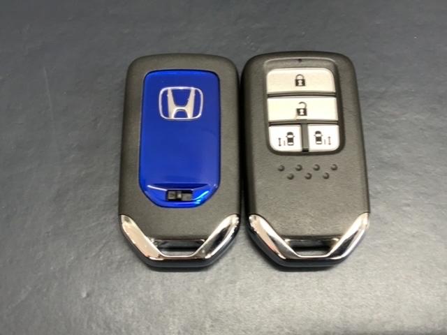 フリードハイブリッド ハイブリッド・Ｇホンダセンシング　最長５年保証　ナビＶＸＭ－２１４ＶＦｉ　ＴＶ　Ｒカメラ　ＣＤ録音　ＢＴオ－ディオ　ＤＶＤ　ＥＴＣ　ＬＥＤライト　両側電動ドア　ＶＳＡ　シ－トヒ－タ－　クルコン　アルミ　スマ－トキ－　盗難防止装置（16枚目）