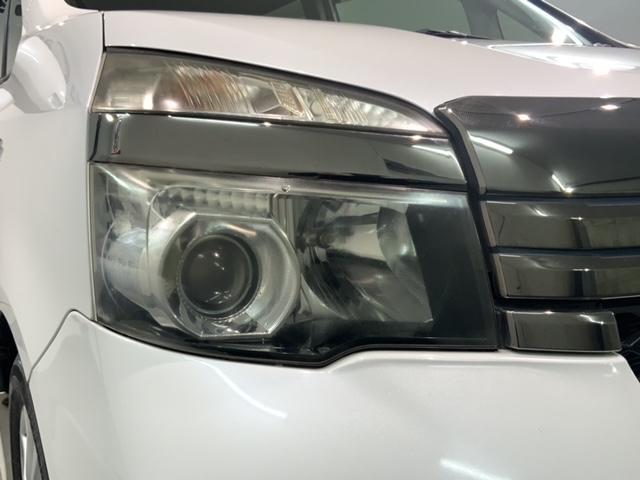 ヴォクシー ＺＳＧ’ｓ　１年保証　純正ナビ　ＴＶ　Ｒカメラ　ＢＴオ－ディオ　ＤＶＤ　ドラレコ　Ｒモニタ－　ＨＩＤ　アルミ　スマ－トキ－　盗難防止装置　整備記録簿　ドアバイザ－　ＡＡＣ　Ｗエアバッグ　ローダウン　地デジ（8枚目）