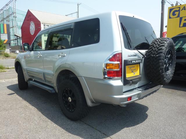 パジェロ ロング　エクシード－Ｉ　４ＷＤ　ＪＡＯＳサスペンション　スキッドプレート　リフトアップ　エクストリームＪ１７インチアルミ　ＴＯＹＯオープンカントリーＭ／Ｔ２６５／７０Ｒ１７タイヤ　社外ナビＴＶ　バックカメラ　ＨＩＤ　ＥＴＣ（3枚目）