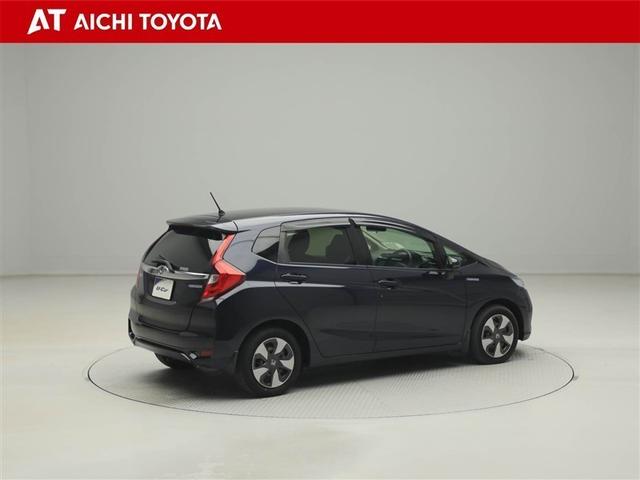 フィットハイブリッド Ｆコンフォートエディション　衝突軽減ブレーキ　セキュリティアラーム　スマキー　クルーズコントロール　ＥＴＣ車載器　ワンセグ　横滑り防止機能　ＡＢＳ　エアバッグ　パワーウインドウ　キーレス　オートエアコン　ＤＶＤ（6枚目）