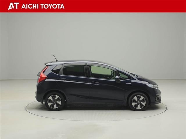 フィットハイブリッド Ｆコンフォートエディション　衝突軽減ブレーキ　セキュリティアラーム　スマキー　クルーズコントロール　ＥＴＣ車載器　ワンセグ　横滑り防止機能　ＡＢＳ　エアバッグ　パワーウインドウ　キーレス　オートエアコン　ＤＶＤ（7枚目）