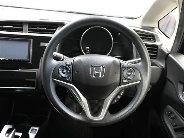 フィットハイブリッド Ｆコンフォートエディション　衝突軽減ブレーキ　セキュリティアラーム　スマキー　クルーズコントロール　ＥＴＣ車載器　ワンセグ　横滑り防止機能　ＡＢＳ　エアバッグ　パワーウインドウ　キーレス　オートエアコン　ＤＶＤ（24枚目）