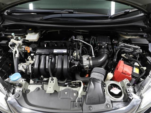 フィットハイブリッド Ｆコンフォートエディション　衝突軽減ブレーキ　セキュリティアラーム　スマキー　クルーズコントロール　ＥＴＣ車載器　ワンセグ　横滑り防止機能　ＡＢＳ　エアバッグ　パワーウインドウ　キーレス　オートエアコン　ＤＶＤ（25枚目）