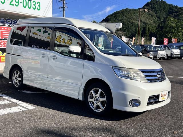 セレナ ハイウェイスター　ワンオーナー　ポップルーフスリーピングバージョン　４ＷＤ　エアロ　インパネオートマ　ナビ　コーナーセンサー　カーテン　両側電動スライドドア　革調フルシートカバー　ソナー　ＰＶガラス　フォグ　１６ＡＷ（8枚目）