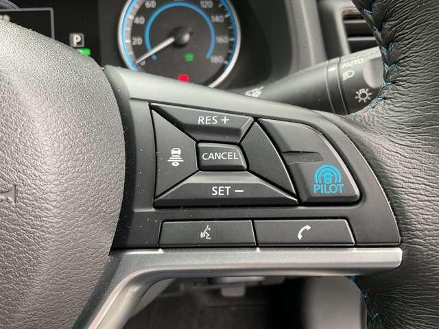 リーフ X Vセレクション 90周年記念車 コネクトナビ プロパイロット 全方位カメ 寒冷地仕様 試乗車UP 全方位カメラ LEDヘッドライト インテリキー レーンキープ 踏み間違い防止 ETC 禁煙車 サイドカーテンエアバック Bカメラ ナビTV(10枚目)