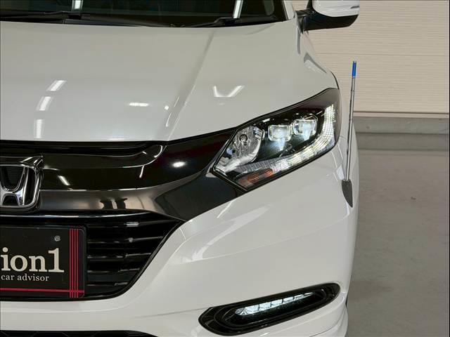 ヴェゼル ハイブリッドＺ・ホンダセンシング　ハーフレザー　レーダークルーズ　純正ナビ　ルーフレール　バックカメラ　シートヒーター　ＵＳＢポート　ＨＤＭＩ　ＥＴＣ　パドルシフト　ステアリングリモコン　Ｂｌｕｅｔｏｏｔｈ　フルセグ　純正１７ＡＷ（25枚目）