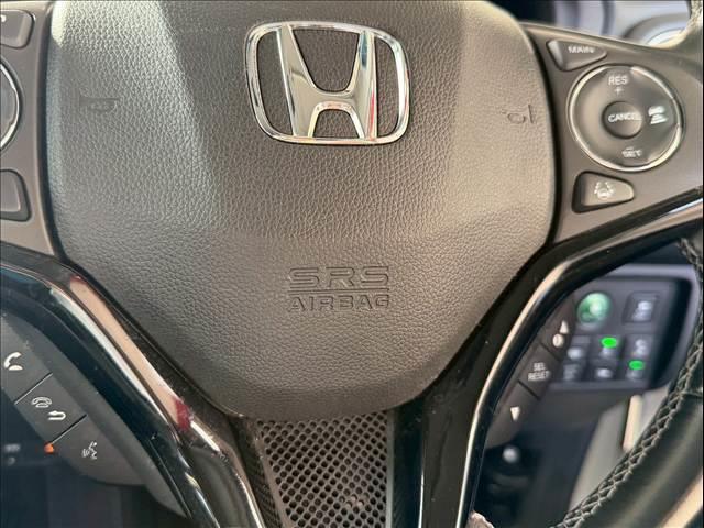 ヴェゼル ハイブリッドＺ・ホンダセンシング　ハーフレザー　レーダークルーズ　純正ナビ　ルーフレール　バックカメラ　シートヒーター　ＵＳＢポート　ＨＤＭＩ　ＥＴＣ　パドルシフト　ステアリングリモコン　Ｂｌｕｅｔｏｏｔｈ　フルセグ　純正１７ＡＷ（68枚目）
