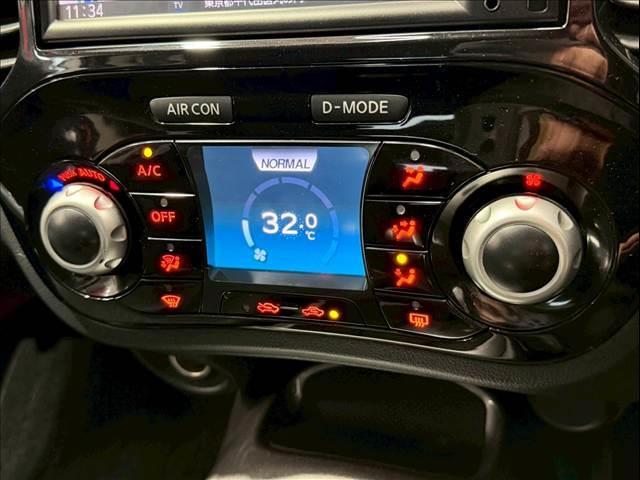 ジューク １５ＲＸ　純正ナビ　バックカメラ　ＥＴＣ　フォグランプ　アイドリングストップ　ドライブモード　純正１６インチアルミ　プッシュスタートボタン　横滑り防止機能　電動格納ミラー　オートライト　ハンズフリー　ＡＵＸ（12枚目）