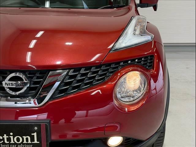 ジューク １５ＲＸ　純正ナビ　バックカメラ　ＥＴＣ　フォグランプ　アイドリングストップ　ドライブモード　純正１６インチアルミ　プッシュスタートボタン　横滑り防止機能　電動格納ミラー　オートライト　ハンズフリー　ＡＵＸ（23枚目）