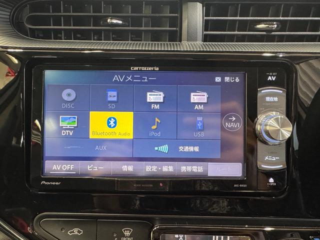 アクア Ｓ　メモリーナビ　Ｂｌｕｅｔｏｏｔｈ　エンジンスターター　横滑り防止　ステアリングリモコン　キーレスキー　ＤＶＤ　ＣＤ　電動格納ミラー　オートエアコン　パワーウインドウ（9枚目）