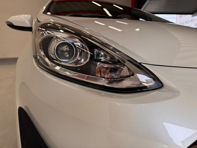 アクア Ｓ　メモリーナビ　Ｂｌｕｅｔｏｏｔｈ　エンジンスターター　横滑り防止　ステアリングリモコン　キーレスキー　ＤＶＤ　ＣＤ　電動格納ミラー　オートエアコン　パワーウインドウ（52枚目）