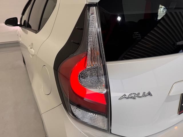 アクア Ｓ　メモリーナビ　Ｂｌｕｅｔｏｏｔｈ　エンジンスターター　横滑り防止　ステアリングリモコン　キーレスキー　ＤＶＤ　ＣＤ　電動格納ミラー　オートエアコン　パワーウインドウ（54枚目）