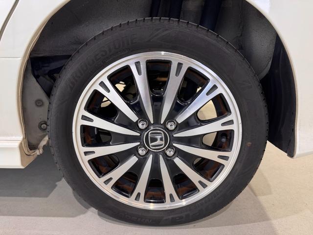 Ｎ－ＢＯＸカスタム Ｇ　ターボＳＳパッケージ　純正ナビ　両側Ｐスラドア　シートヒーター　ＥＴＣ　バックカメラ　フルセグ　クルーズコントロール　ＣＴＢＡ　ドライブレコーダー　ハーフレザーシート　純正１５インチＡＷ　ＨＩＤヘッドライト　横滑り防止（38枚目）