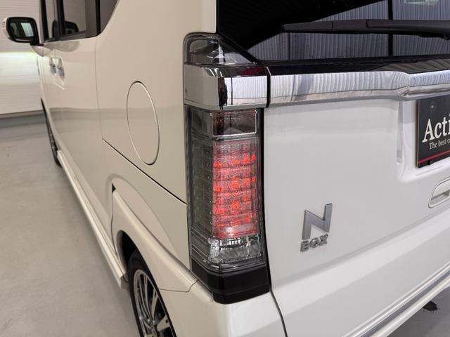 Ｎ－ＢＯＸカスタム Ｇ　ターボＳＳパッケージ　純正ナビ　両側Ｐスラドア　シートヒーター　ＥＴＣ　バックカメラ　フルセグ　クルーズコントロール　ＣＴＢＡ　ドライブレコーダー　ハーフレザーシート　純正１５インチＡＷ　ＨＩＤヘッドライト　横滑り防止（59枚目）