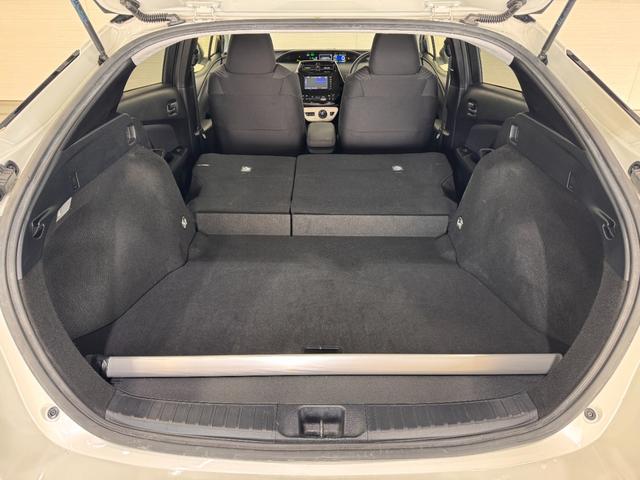 プリウス Ｓセーフティプラス　フルエアロ　デイライト　純正ナビ　レーンアシスト　アダプティブクルーズコントロール　ＨＵＤ　クリアランスソナー　ドライブレコーダー　ＥＴＣ　バックカメラ　パーキングアシスト　純正１５インチＡＷ（34枚目）