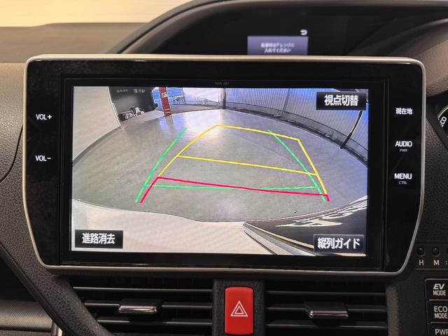 ヴォクシー ハイブリッドＺＳ　煌　純正１０インチナビ　フリップダウンモニター　ＥＴＣ　バックカメラ　ドライブレコーダー　シートヒーター　衝突軽減ブレーキ　両側パワースライドドア　ＵＳＢ　純正１６インチアルミ　ＬＥＤヘッド（10枚目）