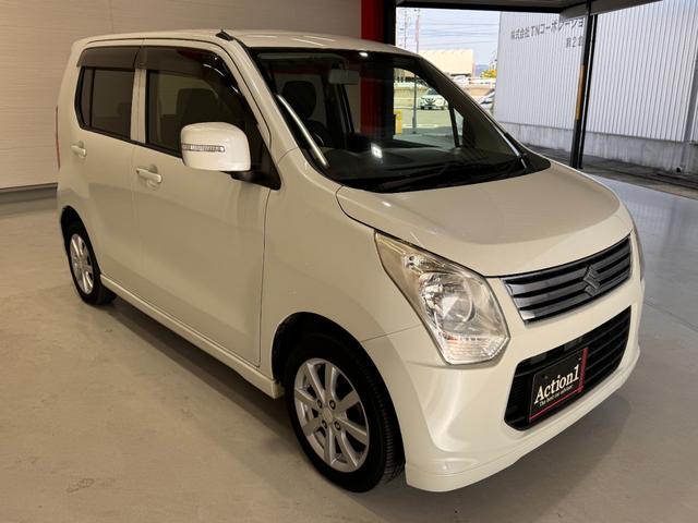 ワゴンＲ ＦＸリミテッド　ワンオーナー　メモリーナビ　テレビ　ＣＤ　アイドリングストップ　オートエアコン　純正１４インチアルミ　プッシュスタート　スマートキー　ライトレベライザー　パワーウインドウ（3枚目）