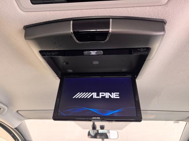 ヴォクシー ハイブリッドＶ　ＡＬＰＩＮＥナビ　フリップダウンモニター　両側パワースライドドア　ＥＴＣ　シートヒーター　クルーズコントロール　純正１５インチＡＷ　ＬＥＤヘッドライト　フォグランプ　スマートキー（9枚目）