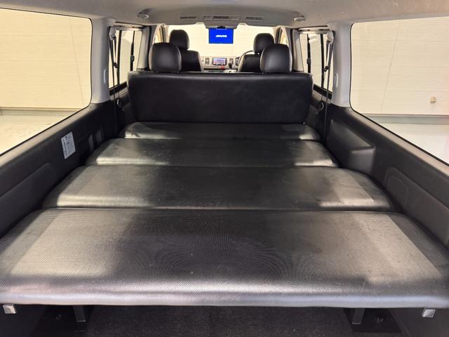 ハイエースバン ロングスーパーGL ベッドキット フリップダウンモニター メモリーナビ ETC バックドア スライドドア Bluetooth フルセグTV DVD CD Wエアコン HIDヘッドライト フォグランプ オートエアコン(3枚目)