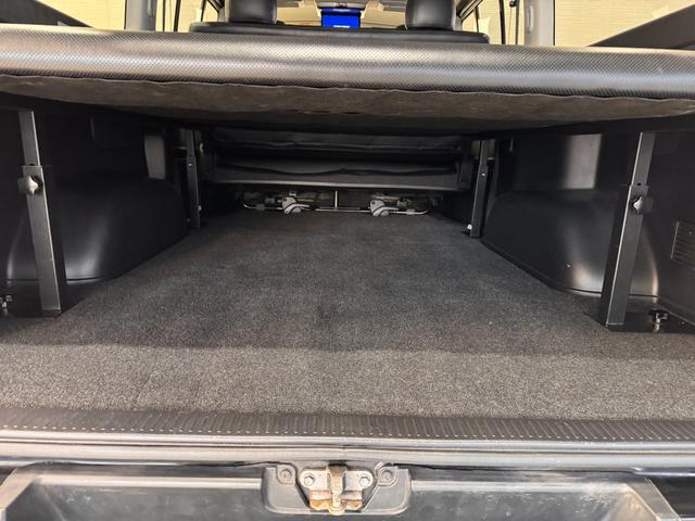 ハイエースバン ロングスーパーGL ベッドキット フリップダウンモニター メモリーナビ ETC バックドア スライドドア Bluetooth フルセグTV DVD CD Wエアコン HIDヘッドライト フォグランプ オートエアコン(27枚目)