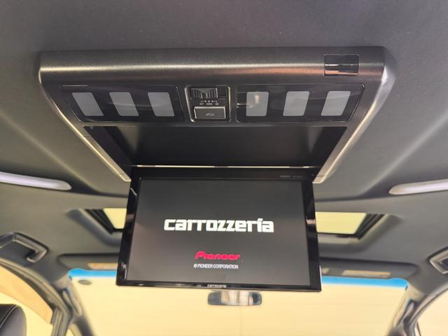 ヴェルファイア ２．５Ｚ　Ａエディション　ゴールデンアイズ　ンルーフ　ＯＰフロントバンパー＆Ｆグリル　ＬＥＤスタイリッシュビーム　１０インチナビ　フリップダウンモニター　ＥＴＣ　Ｂカメラ　両側Ｐスラドア　クリアランスソナー　Ｂｌｕｅｔｏｏｔｈ　ハーフレザー（10枚目）