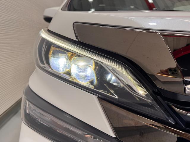 ヴェルファイア ２．５Ｚ　Ａエディション　ゴールデンアイズ　ンルーフ　ＯＰフロントバンパー＆Ｆグリル　ＬＥＤスタイリッシュビーム　１０インチナビ　フリップダウンモニター　ＥＴＣ　Ｂカメラ　両側Ｐスラドア　クリアランスソナー　Ｂｌｕｅｔｏｏｔｈ　ハーフレザー（39枚目）
