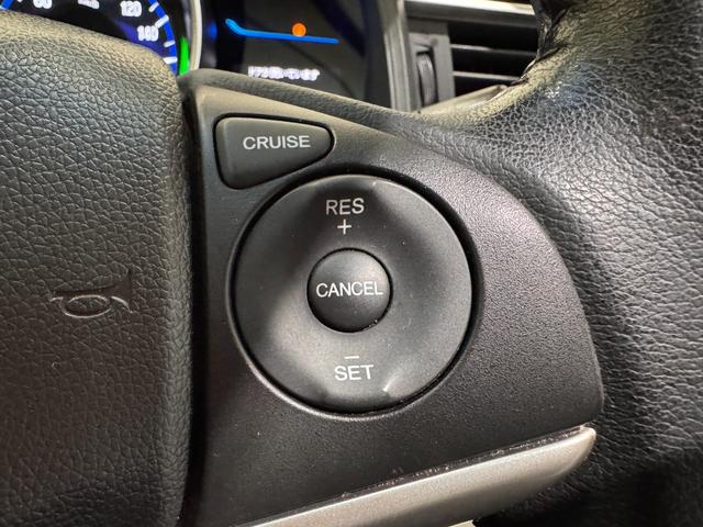 フィットハイブリッド Ｌパッケージ　純正ナビ　ＥＴＣ　バックカメラ　クルーズコントロール　ハーフレザーシート　Ｂｌｕｅｔｏｏｔｈ　テレビ　ＤＶＤ　ＣＤ　社外１５インチＡＷ　ＬＥＤヘッドライト　プッシュスタート　スマートキー（14枚目）