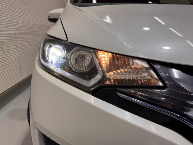 フィットハイブリッド Ｌパッケージ　純正ナビ　ＥＴＣ　バックカメラ　クルーズコントロール　ハーフレザーシート　Ｂｌｕｅｔｏｏｔｈ　テレビ　ＤＶＤ　ＣＤ　社外１５インチＡＷ　ＬＥＤヘッドライト　プッシュスタート　スマートキー（31枚目）