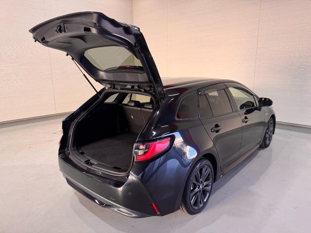 カローラツーリング ハイブリッド　ダブルバイビー　純正ナビ　ＥＴＣ　Ｂカメラ　アダプティブクルーズコントロール　クリアランスソナー　シートヒーター　ステアリングヒーター　レーンアシスト　衝突軽減ブレーキ　ハーフレザー　ＢＴ　純正１７インチＡＷ（61枚目）