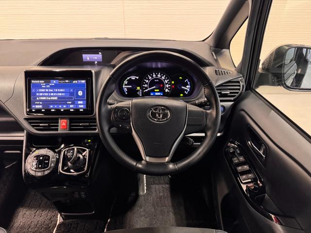 ノア ハイブリッドＳｉ　ダブルバイビーＩＩ　純正９インチナビ　フリップダウンモニター　両側Ｐスラドア　クリアランスソナー　クルコン　ＥＴＣ　Ｂカメラ　シートヒーター　ドラレコ　ハーフレザー　純正１６インチＡＷ　レーンアシスト　衝突軽減ブレーキ（31枚目）