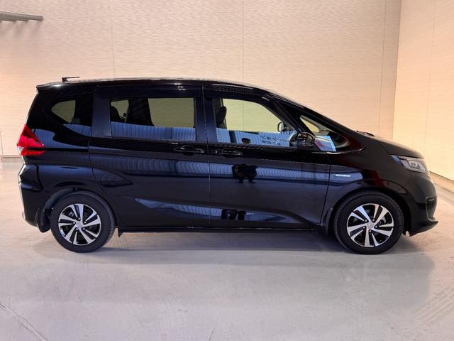 フリードハイブリッド ハイブリッド・EX 純正ナビ ETC Bカメラ 両側Pスラドア シートヒーター ハーフレザー クルーズコントロール 衝突軽減ブレーキ ウォークスルー 純正15インチAW LEDヘッドライト ステリモ Bluetooth(23枚目)