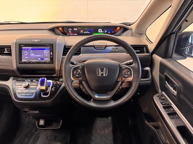 フリードハイブリッド ハイブリッド・EX 純正ナビ ETC Bカメラ 両側Pスラドア シートヒーター ハーフレザー クルーズコントロール 衝突軽減ブレーキ ウォークスルー 純正15インチAW LEDヘッドライト ステリモ Bluetooth(26枚目)