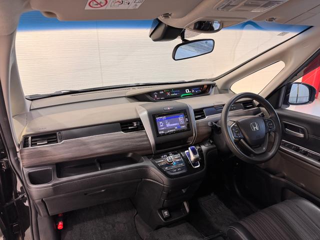 フリードハイブリッド ハイブリッド・EX 純正ナビ ETC Bカメラ 両側Pスラドア シートヒーター ハーフレザー クルーズコントロール 衝突軽減ブレーキ ウォークスルー 純正15インチAW LEDヘッドライト ステリモ Bluetooth(28枚目)