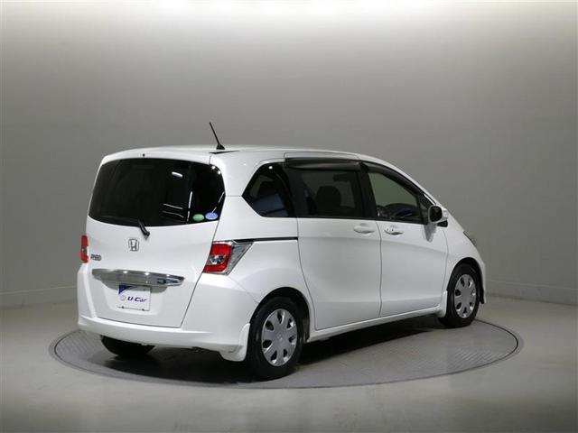 フリード Ｇ　ジャストセレクション　メモリーナビ　フルセグ　バックカメラ　ＥＴＣ　ＣＤ　ミュージックプレイヤー接続可　ＤＶＤ再生　ＨＩＤヘッドライト　両側電動スライド　乗車定員７人　３列シート　スマートキー　キーレス（6枚目）