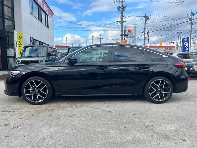 シビック ＬＸ　６速マニュアル　ホンダセンシング　純正ナビ　フルセグＴＶ　バックカメラ　ＥＴＣ２．０　プッシュスタート　スマートキー　運転席＆助手席シートヒーター　純正アルミ（8枚目）