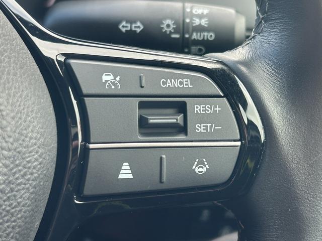 シビック ＬＸ　６速マニュアル　ホンダセンシング　純正ナビ　フルセグＴＶ　バックカメラ　ＥＴＣ２．０　プッシュスタート　スマートキー　運転席＆助手席シートヒーター　純正アルミ（26枚目）